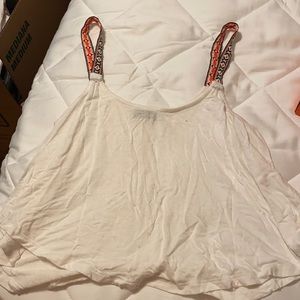 Cute white tank top with native print straps